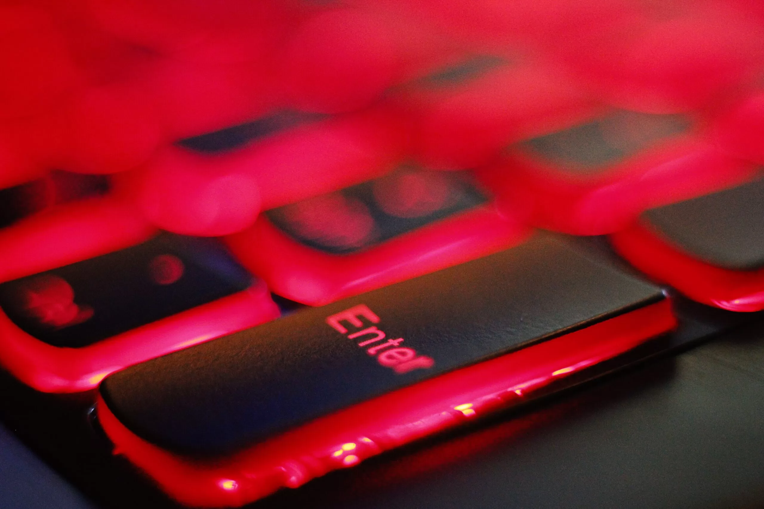 a close up of a red and black keyboard to portray online security